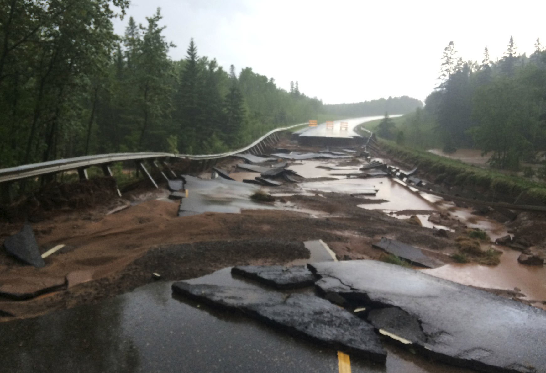 Minnesota Highway 23 flooding damage, AP photo